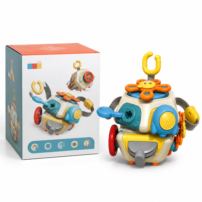 The vibrant 6-in-1 Educational Cube, shaped like a robot and featuring gears, buttons, and keys for sensory play, makes an engaging travel toy for babies—displayed alongside its matching packaging box adorned with the same toy image and playful design elements.